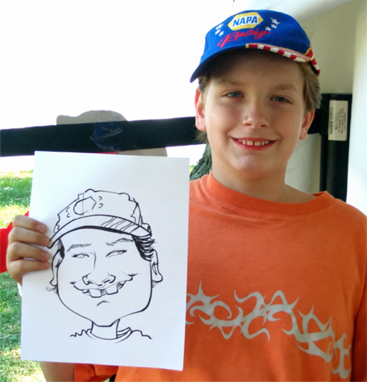 Live event caricature of a boy in a racing cap