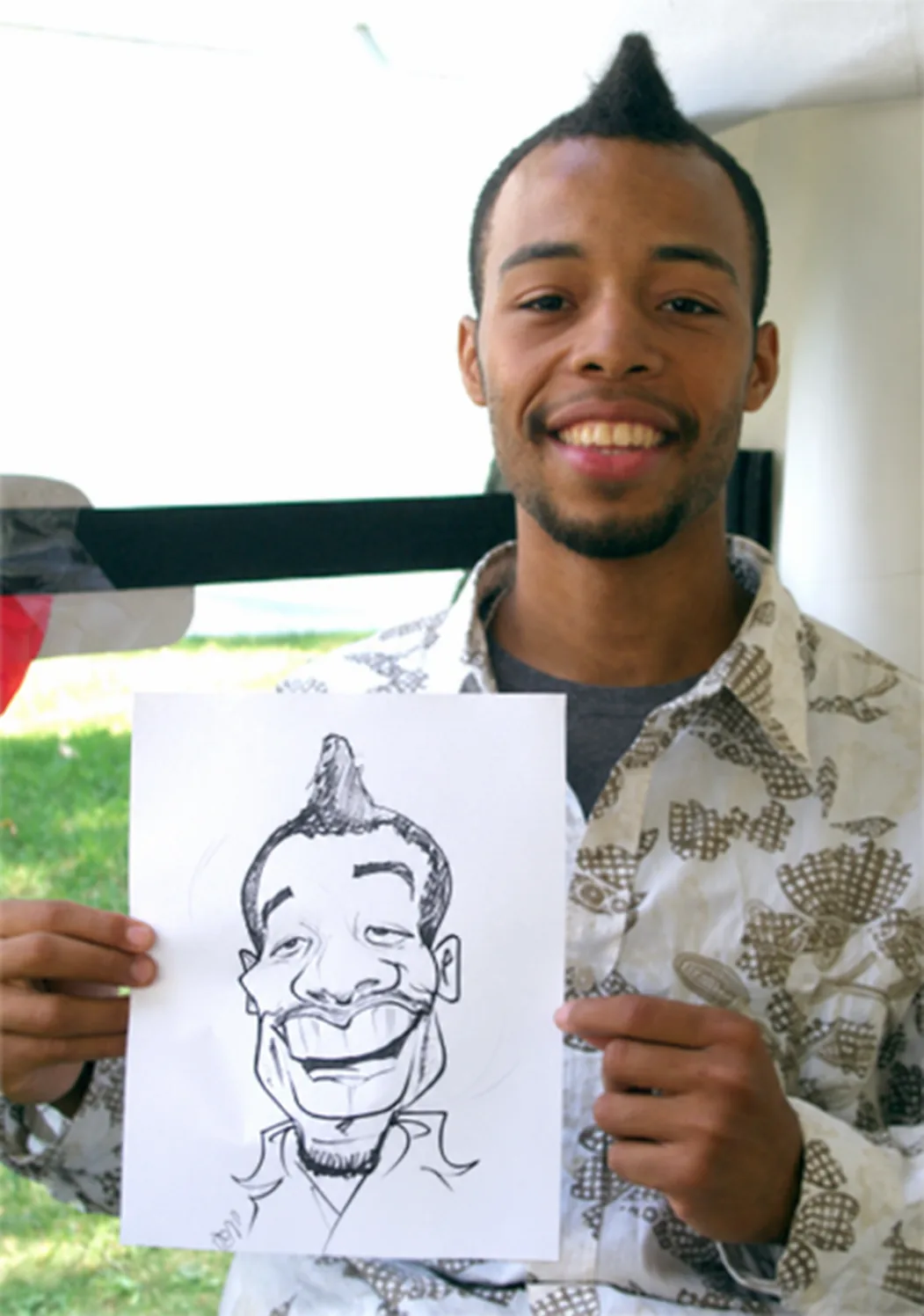 Live event caricature of a man with a mohawk